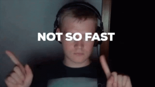 Young Man with Headphones Saying Not So Fast