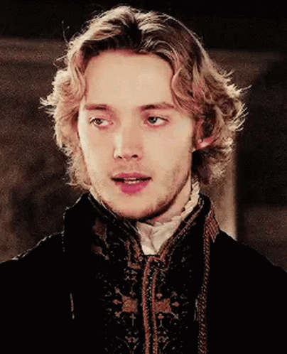 Young Man With Long Blonde Hair And Beard In Black Jacket GIF