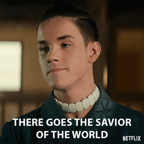 Young Man with Necklace Saying There Goes the Savior