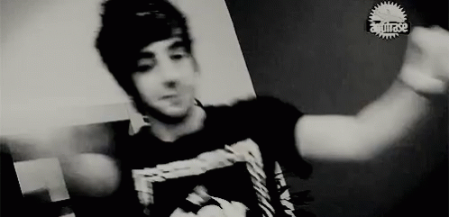 Young Man With Outstretched Arms GIF
