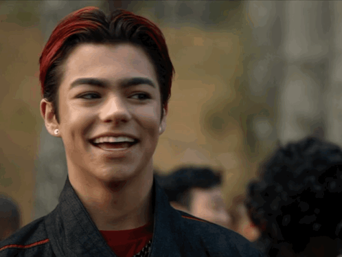 Young Man with Red Hair Smiling