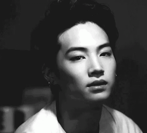 Young Man With Serious Expression GIF