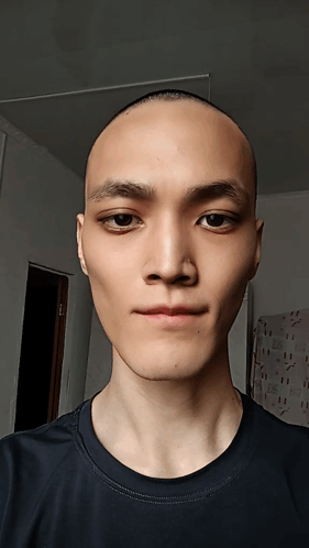 Young Man with Shaved Head