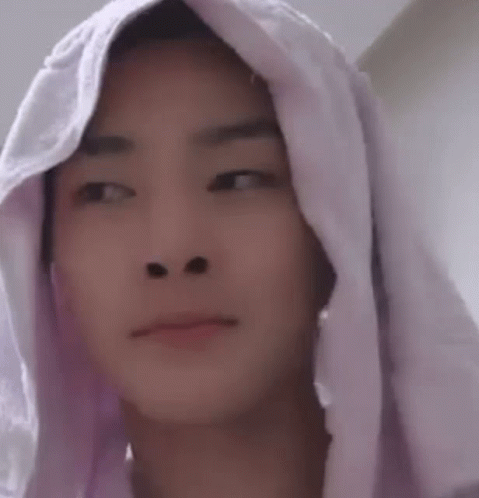 Young Man with Towel on Head