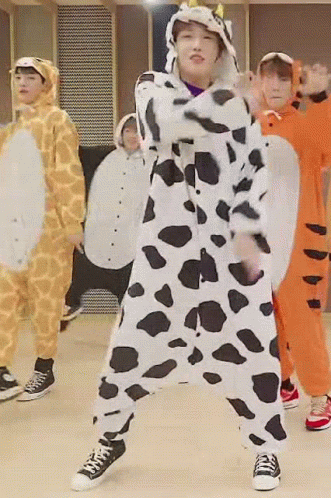 Young Men Dancing in Animal Costumes