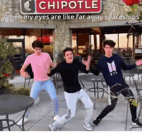 Young Men Dancing in Front of Chipotle