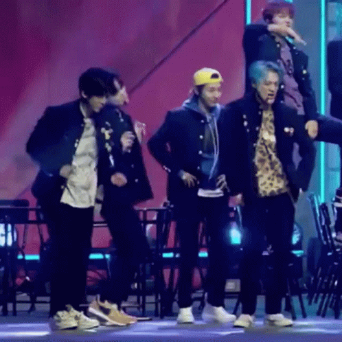 Young Men Dancing On Stage GIF
