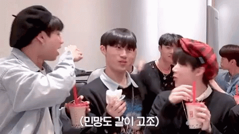 Young Men Eating Ice Cream and Drinking Bubble Tea