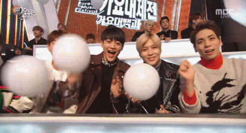 Young Men Holding Cotton Candy Balls at Korea Music Festival