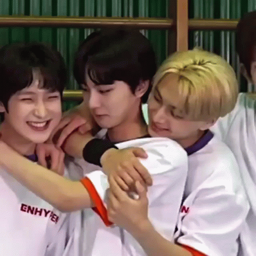 Young Men Hugging in White Shirts
