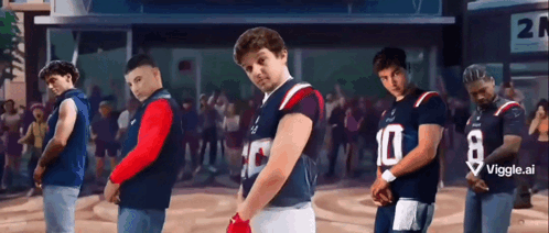 Young Men In Football Uniforms Number 10 In Front Of Crowd GIF