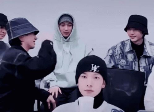 Young Men In Hats And Hoodies With W Beanie GIF