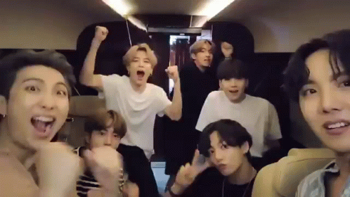 Young Men Making Funny Faces in Car