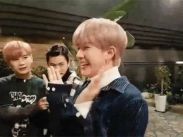 Young Men, One Wearing Chicago Shirt GIF