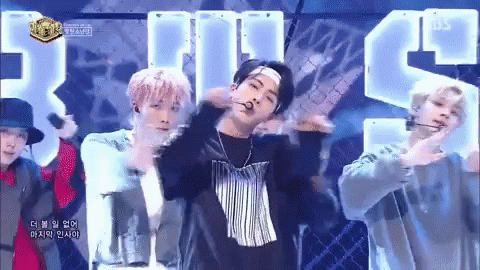 Young Men Performing On Stage In Front Of BS Logo GIF