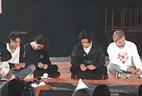 Young Men Playing Hands on Stage