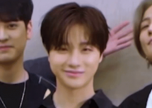 Young Men Posing For Picture With Funny Face GIF