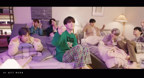 Young Men Sitting on Beds Giant Dad Sweater