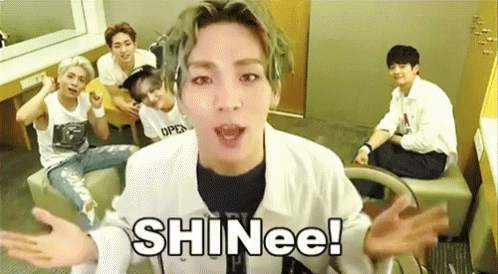 Young Men Sitting on Couch Saying Shinee