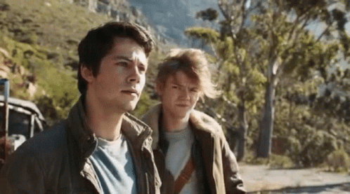 Young Men Standing On Road GIF
