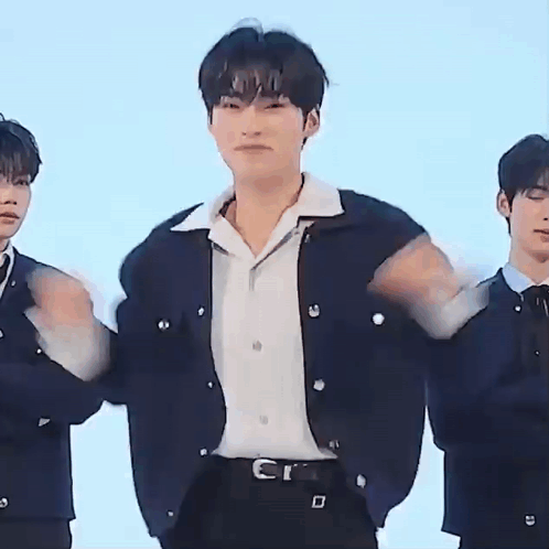 Young Men Standing Together GIF
