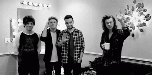 Young Men Standing Together GIF