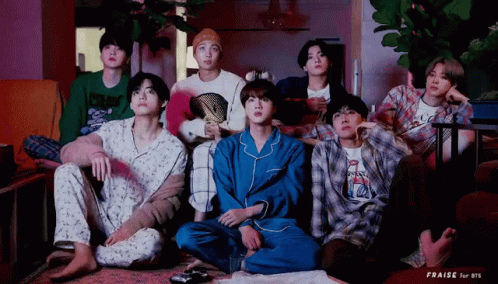 Young Men Watching TV on Couch