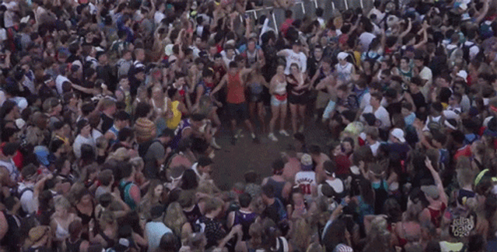 Young People Crowd Having Fun In Mosh Pit GIF