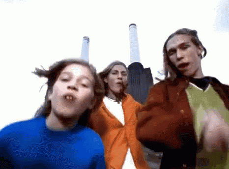 Young People Dancing In Front Of Factory GIF