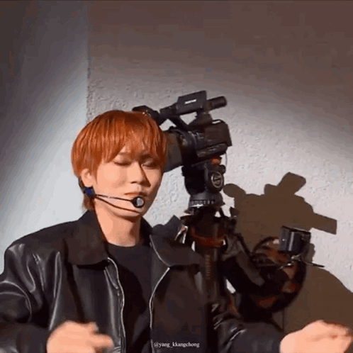 Young Red-Haired Man Facing Camera