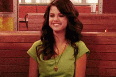 Young Selena Gomez Demure Giggling GIF