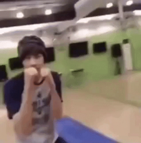 Young Seventeen Wonwoo Punching Air GIF