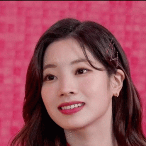 Young Woman on Pink Background