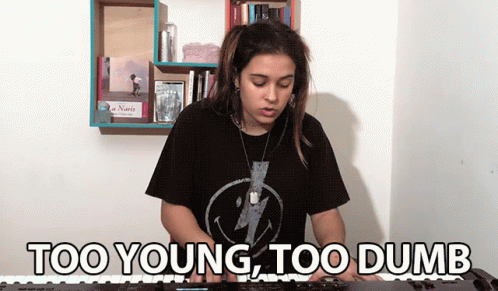 Young Woman Playing Keyboard Too Young Too Dumb