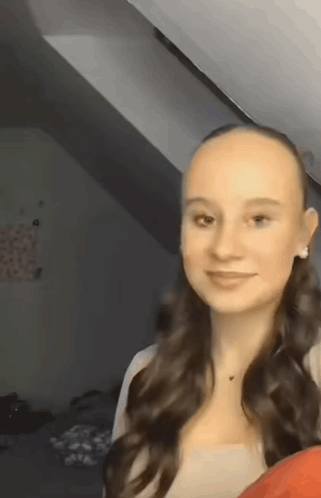 Young Woman With Long Hair and Bald Head