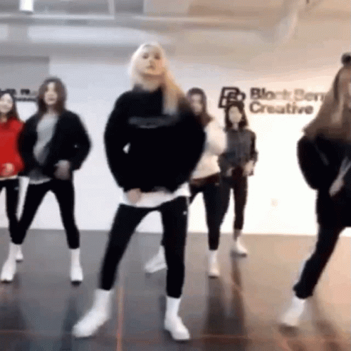 Young Women Dancing With Block Service Creative Sign