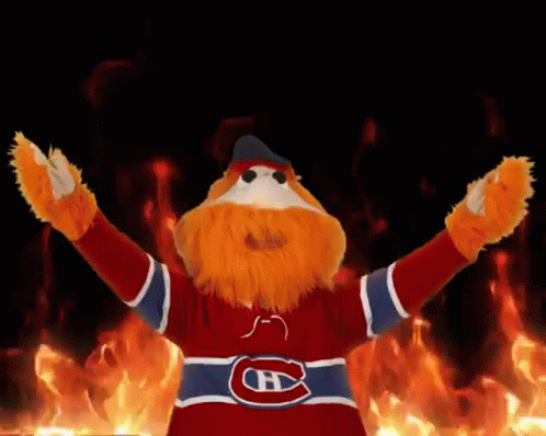 Youppi Mascot Blazing Wildfire Background GIF