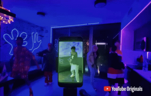 YouTube Music Ad People Dancing Blue Lights GIF