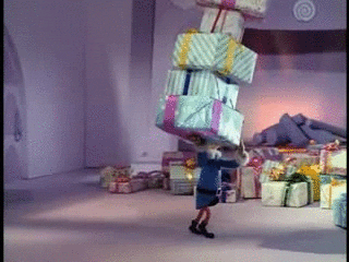 Yukon Cornelius Head Elf Preparing Gift GIF