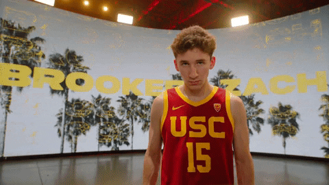 Zach Brooker Usc Player Crossing Arms For Pose GIF
