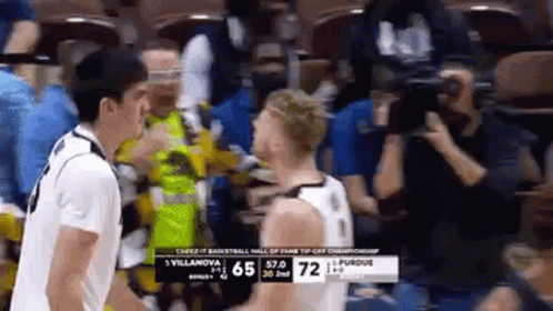 Zach Edey Chest Bump Loop GIF