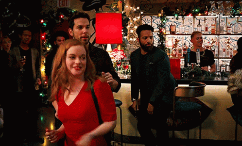 Zoey Clarke Max Richman Attending Christmas Party GIF