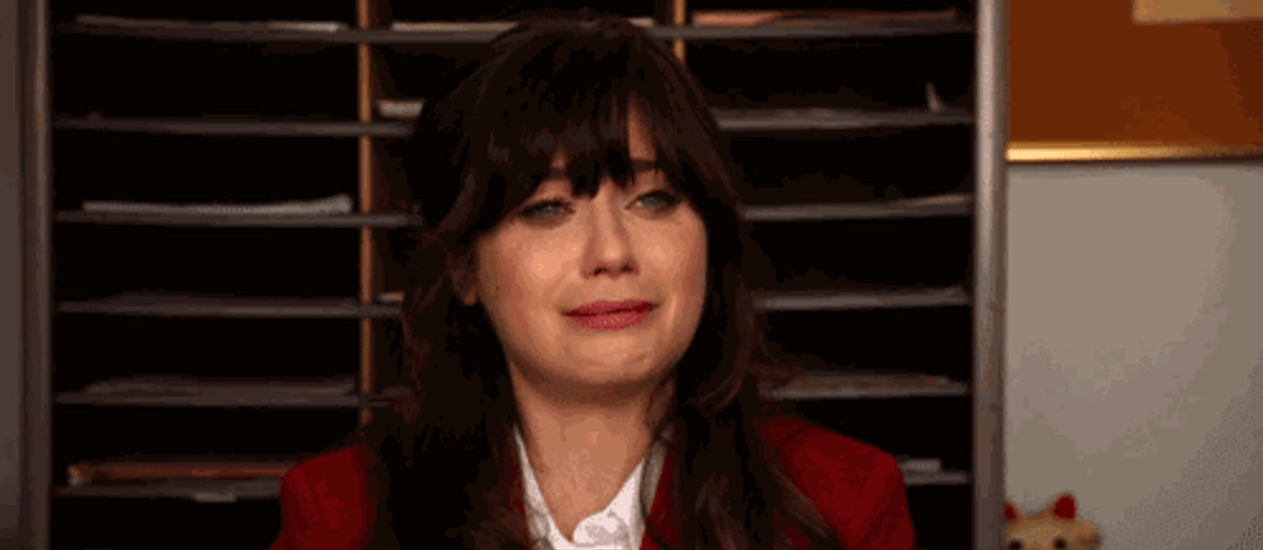 Zooey Deschanel Highly Emotional Trying Not To Cry GIF