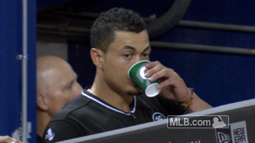 Stanton Drinking Coffee Smiles