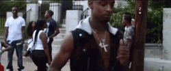 21 Savage Holding Cup While Walking GIF