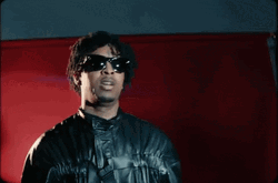 21 Savage Loser Hand Sign GIF
