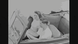 40s Couple Riding Together