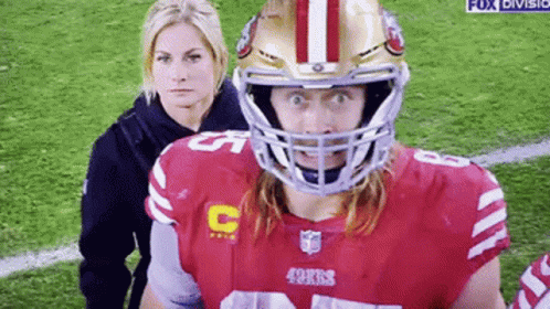 49Ers Football Player With Woman Behind GIF
