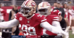 49ers Kinlaw Taps Chest