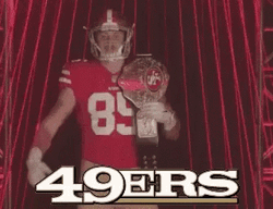 49ers Kittle Showing Trophy